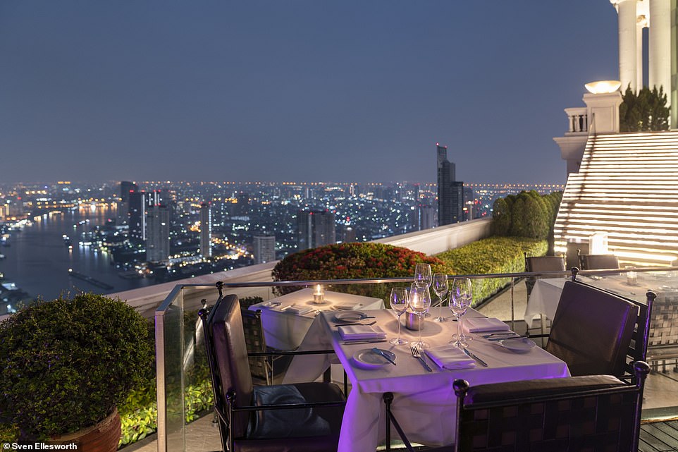 Hostesses in golden gowns serenely usher diners through the restaurant entrance on the 64th floor, says Ailbhe