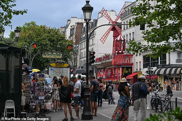 The Boulevard de Clichy (pictured) is a famous street in Paris lined with erotic sex shops (file photo)