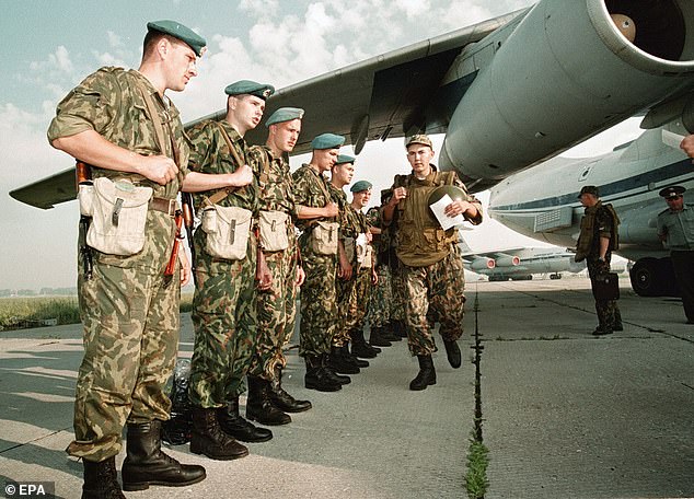 Russian paratroopers are pictured before boarding a IL-76 transport plane in Ryazan destined for Pristina airport in Kosovo