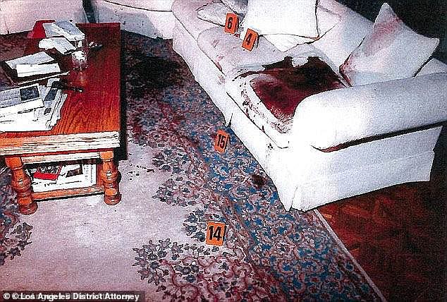 Chilling crime scene photos showing the blood-soaked couch where Jose Menendez was shot