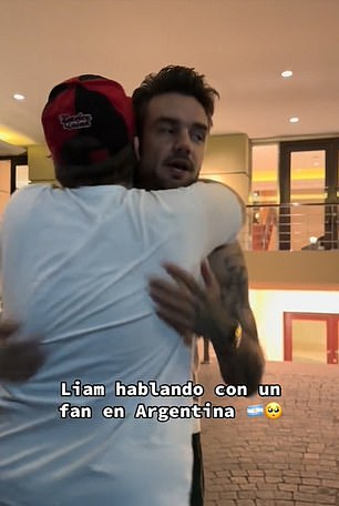 Liam hugs a fan