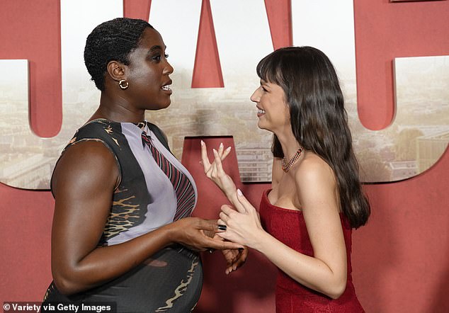 Corbero and Lashana were seen crossing paths on the red carpet and held a lighthearted conversation as they caught up