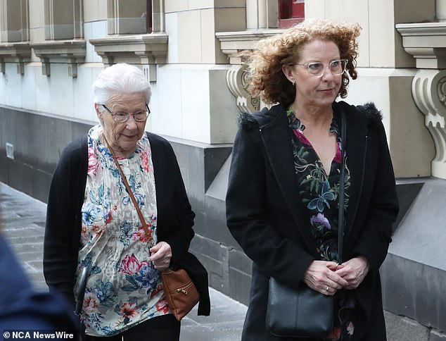 Russell Hill's wife Robyn (left) and daughter Deborah arrive at the Supreme Court in Melbourne on Friday