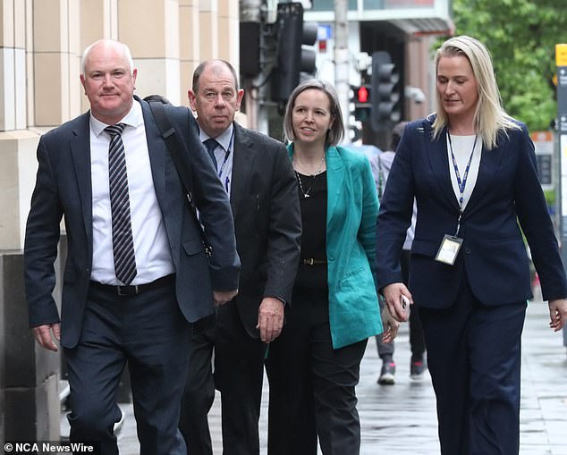 Detective Brett Florence (left) led the probe to convict Greg Lynn. He is pictured arriving at court in Melbourne on Friday