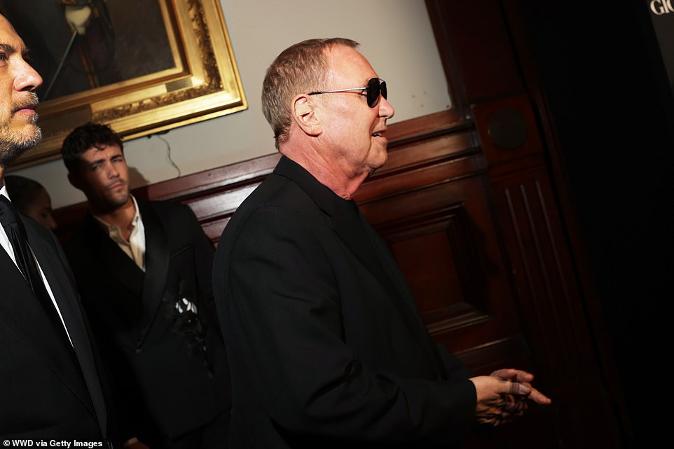 Designer Michael Kors rolled up to the event with his entourage