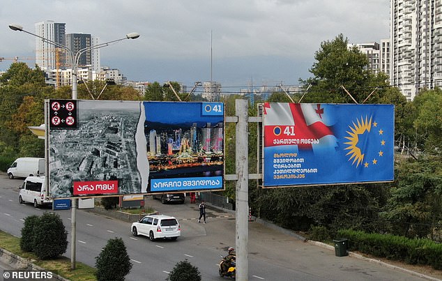 Across the country Georgian Dream election billboards have been erected with pictures of Ukrainian cities destroyed by Russian bombs under the simple caption: 'Choose peace'