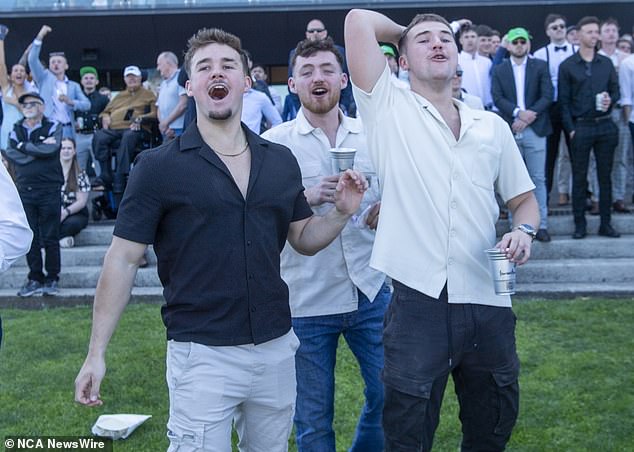 A day at Royal Randwick is guaranteed to provide plenty of colour (pictured, eager punters trackside)