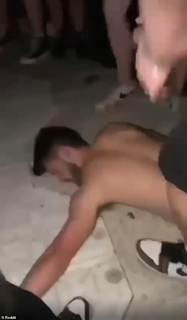 In the video, purportedly taken at Travis' show on Thursday, showed a shirtless man seemingly placing another concertgoer into a chokehold before violently tossing him to the ground