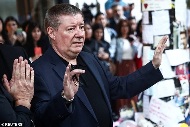 Geoff Payne, father of former One Direction band member Liam Payne, waves to people outside the hotel where Liam Payne was found dead