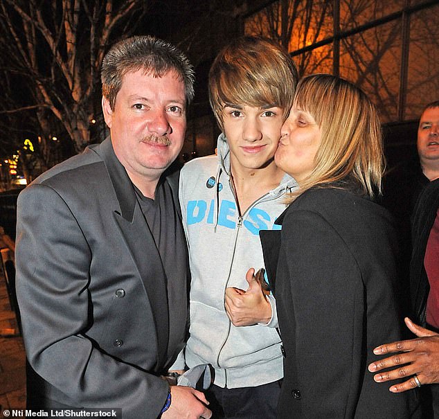 Liam is pictured with his mother Karen and father Geoff after the X Factor final in 2010