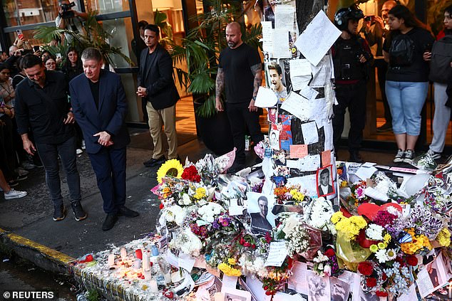 Geoff Payne stands near tributes left outside the hotel where Liam Payne was found dead