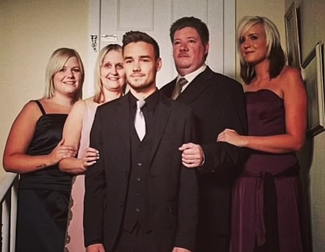 Liam is pictured with his mother, father and two sisters. The singer's family paid tribute to the 31-year-old on Thursday, saying they were 'heartbroken' following his death