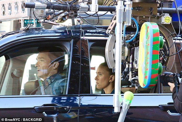 Johansson got into the backseat of the SUV for the scene, while Friend served as the driver