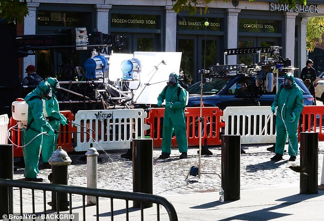 The set took place in front of Shake Shack restaurant, and featured a group of at least four people in hazmat suits touching up the area and spraying some sort of liquid in an area that resembled sand