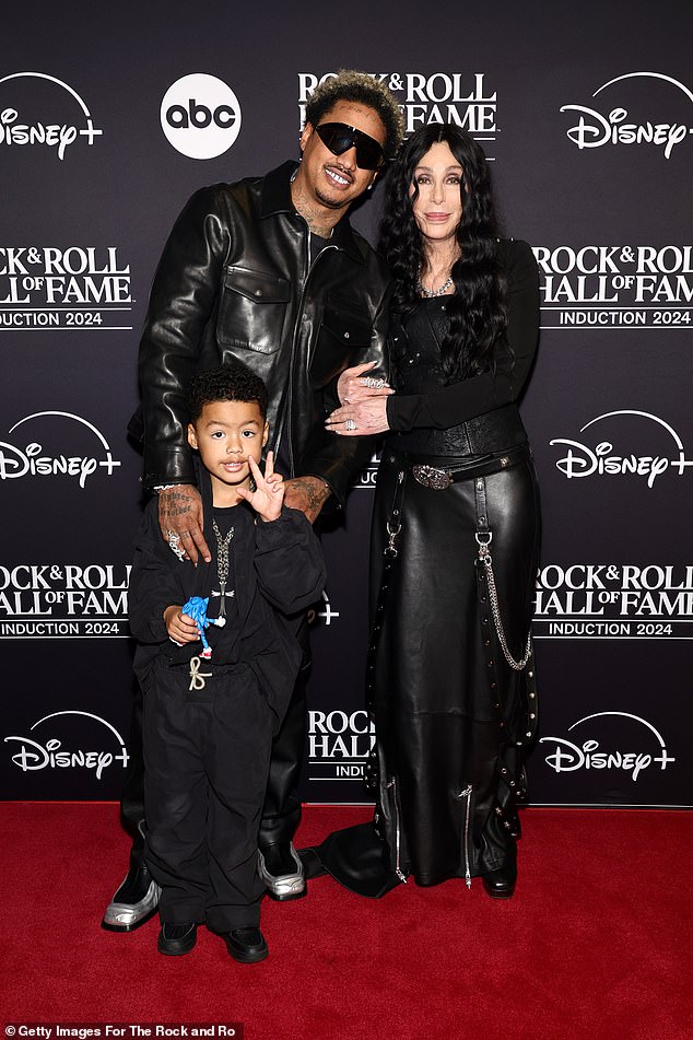 On the red carpet, she was joined by her boyfriend, Alexander 'AE' Edwards and his four-year-old son, Slash Electric Alexander Edwards