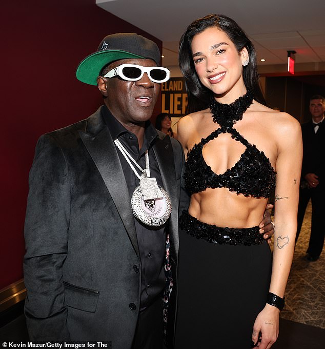 Inside of the venue, she was seen posing for a snap with Flavor Flav, 65, before she took the stage to perform at the ceremony