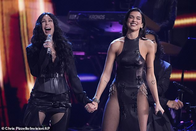 Onstage, she was joined by Cher — who looked mesmerizing in a head-to-toe, patent leather look