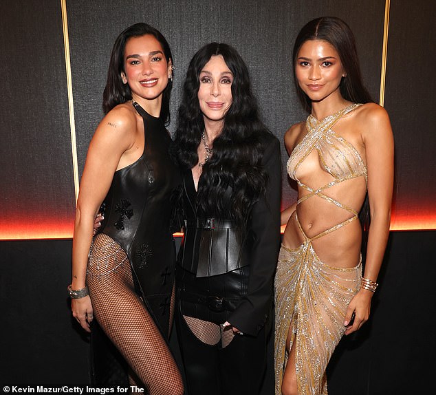 Later, inside of the venue, Cher was also seen posing for a snap alongside Zendaya and Lipa, after she underwent a costume change and took the stage at the event