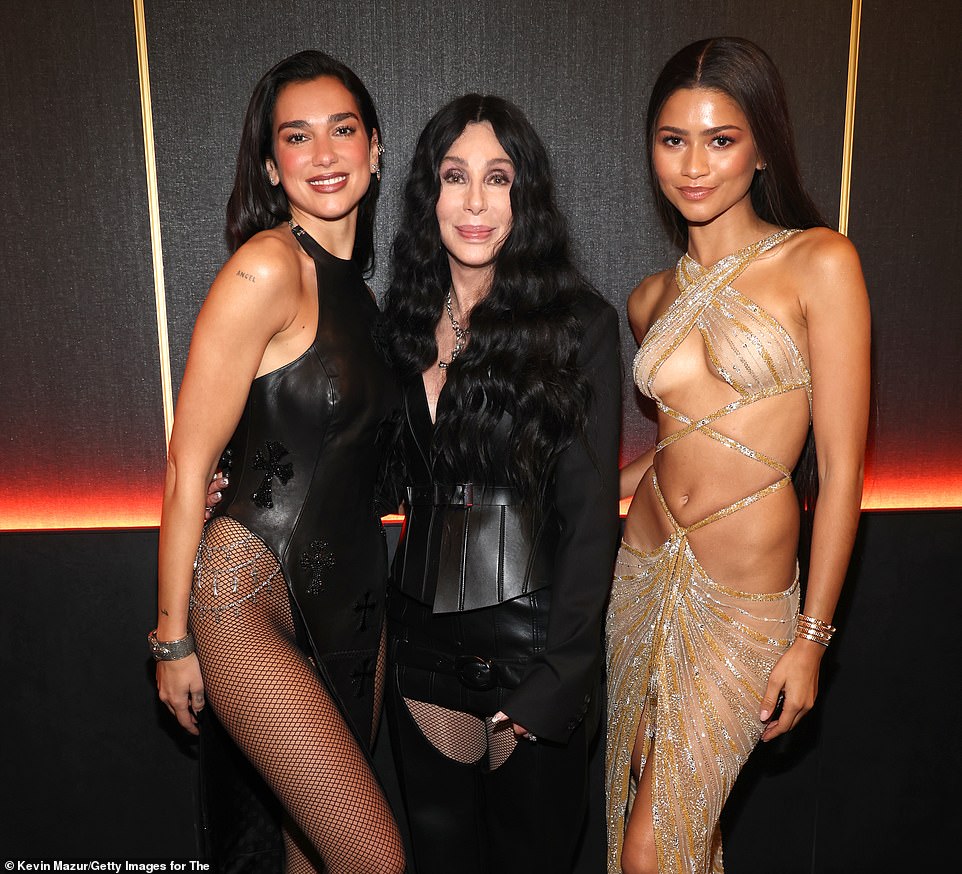 Later in the evening, Zendaya inducted Cher and expressed to the crowd, 'Where do I even begin? Cher is not one person. Her name is just as legendary as her legacy'; Dua Lipa, Cher and Zendaya seen backstage