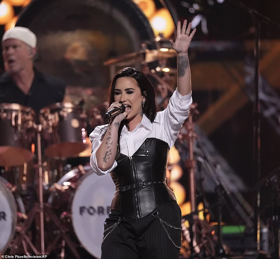 Demi Lovato helped pay tribute to the rock band, Foreigner, with Slash, Sammy Hagar, Chad Smith and also Kelly Hansen