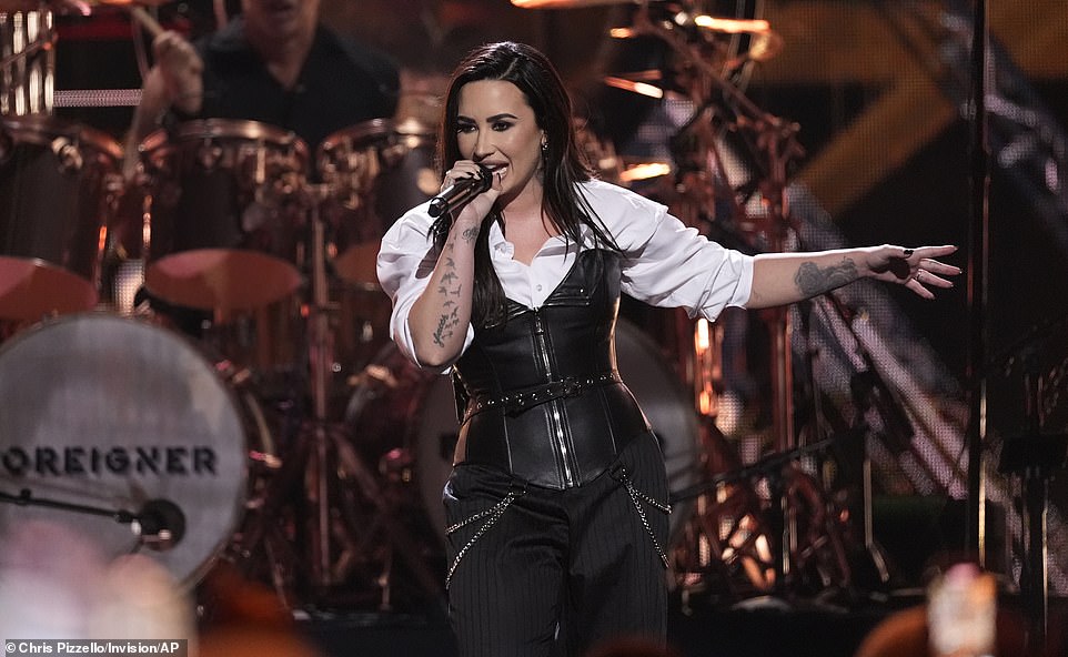 Lovato also took to the stage during the festivities with Slash to pay tribute to the rock band, Foreigner