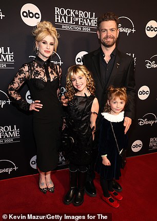 On the red carpet, she was joined by her brother, Jack Osbourne, and his daughters — Andy, seven, and Minnie, five