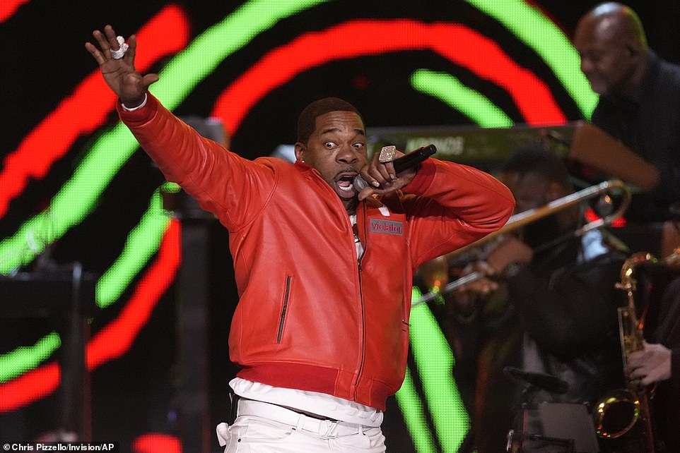 Busta Rhymes was seen wearing a pair of white pants as well as a red, leather jacket as he moved about on stage with Common