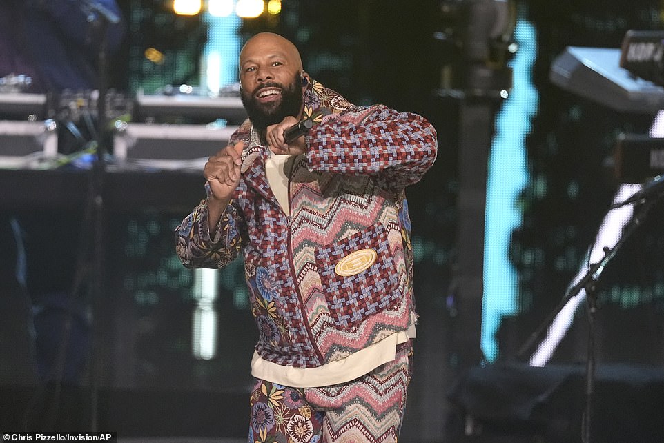 Common showed off his own personal sense of style in a colorful, patterned jacket as well as matching trousers during the special set