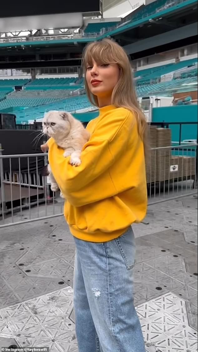 As Kelce was playing with his Chiefs in California, Swift was 3,000 miles away Florida preparing for her third and last show at Hard Rock Stadium in Miami; she is pictured before her concert in Miami on Friday