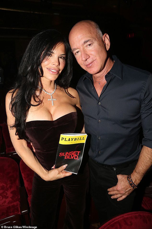 Jeff Bezos, 60, and his fiancé Lauren Sanchez, 54, cozied up to each other inside the theatre