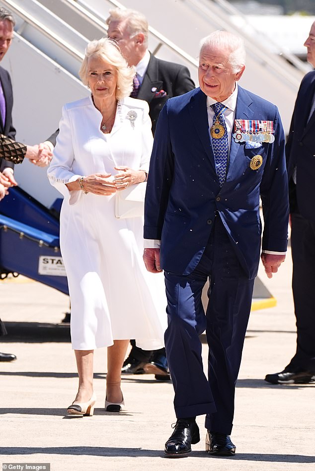 King Charles III and Queen Camilla arrive for a visit at Canberra Airport on October 21, 2024 in Canberra, Australia