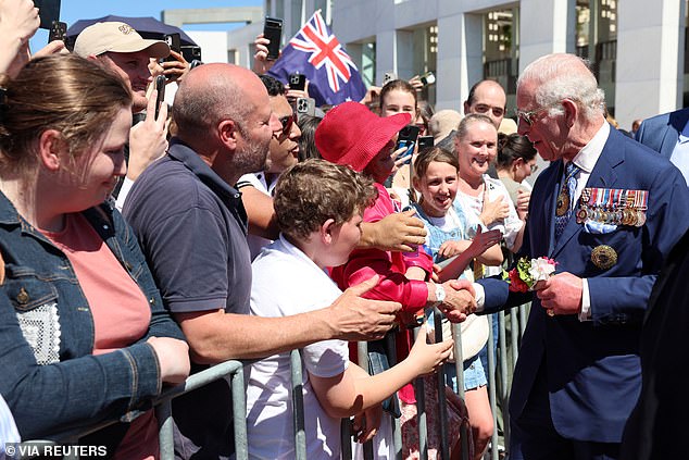 Hundreds of royal fans lined the streets to meet the King and Queen