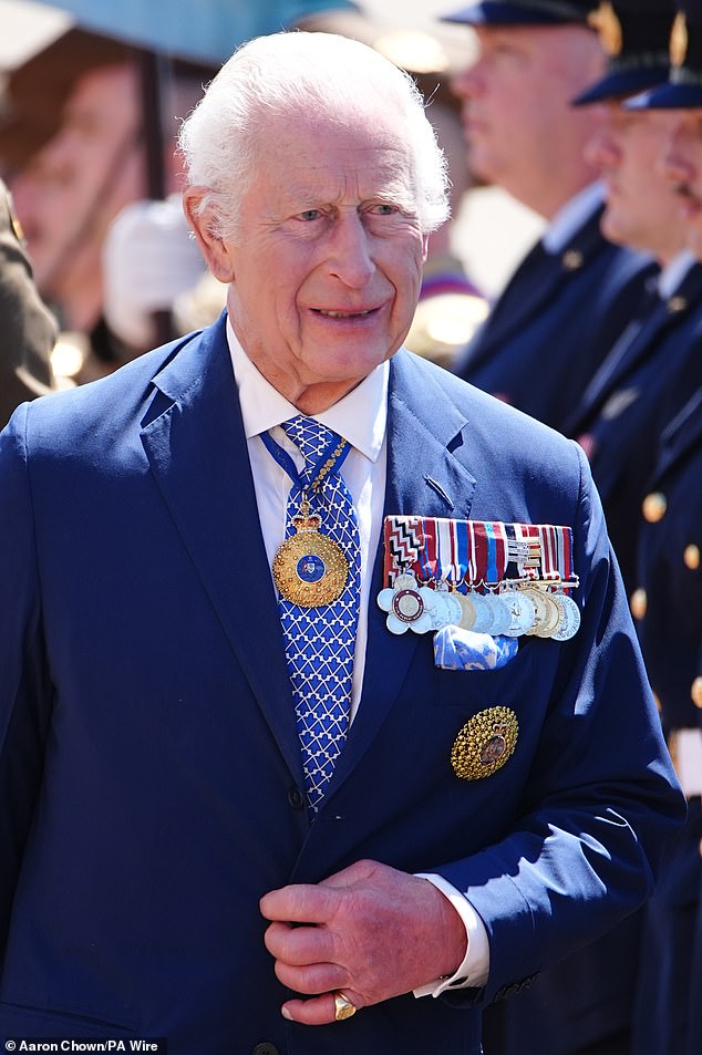 King Charles III views The Royal Guard of Honour during the Ceremonial Welcome to Australia