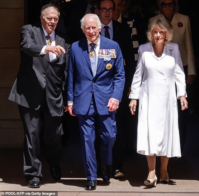 Britain's King Charles III and Queen Camilla arrive at the Australian War Memorial accompanied by Australian War Memorial Council Chair Kim Beazley