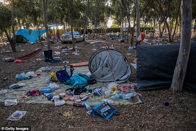 Destroyed cars and personal effects are still left scattered around the Supernova Music Festival site, where hundreds were killed and dozens taken by Hamas militants near the border with Gaza, on October 13, 2023 in Kibbutz Re'im, Israel