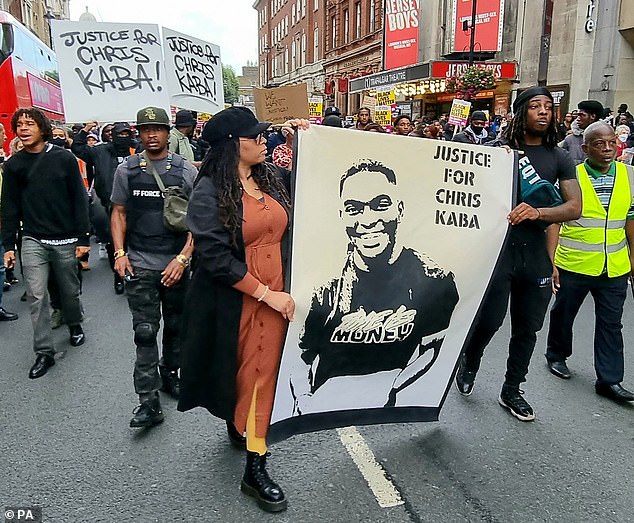 Protesters marching to New Scotland Yard in September 2022 after the death of Chris Kaba