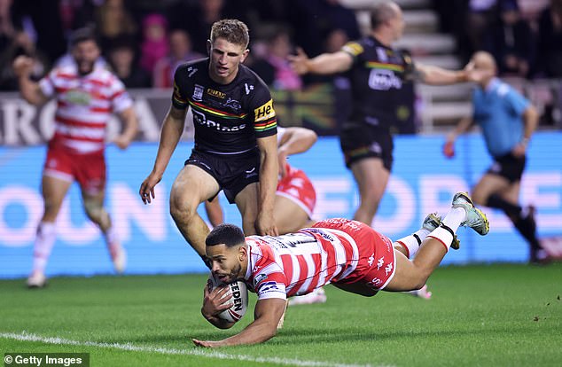 Leeming dives over for a try in Wigan's Super League clash with Catalans Dragons in February