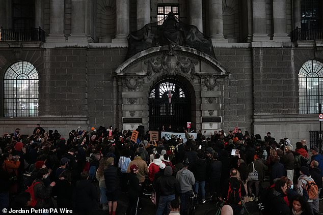 People demonstrate outside the Old Bailey in central London after a police marksman who fatally shot Chris Kaba has been cleared of his murder