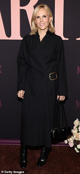 Designer Tory Burch, 58, was also in attendance, and looked chic as ever in an oversized black coat with a gold belt buckle