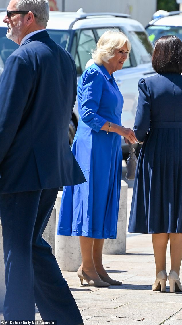 As Camilla, 77, dressed in a regal blue midi dress that flattered her timeless style, waved to the small crowd gathered for her public appearance, it's safe to say the MAFS cast couldn’t resist watching the Queen's grand entrance