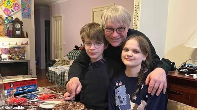 Jonathan Walker (pictured with two of his seven children) and his family have been left with a ruined house and $10,000 in damages after a hailstorm