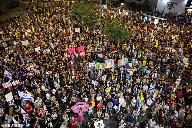 People protest against the government, to demand a ceasefire deal and the immediate release of hostages kidnapped during the deadly October 7, 2023 attack by Hamas, in Tel Aviv, Israel