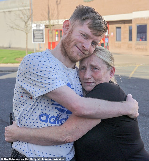 Amanda Sharp posed with her son James Sharp after his release from prison on Tuesday