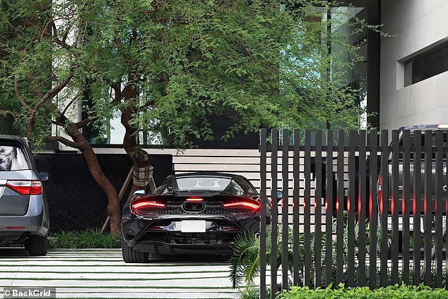 Beckham drives his McLaren 750S into the Miami property which has sold for £60million