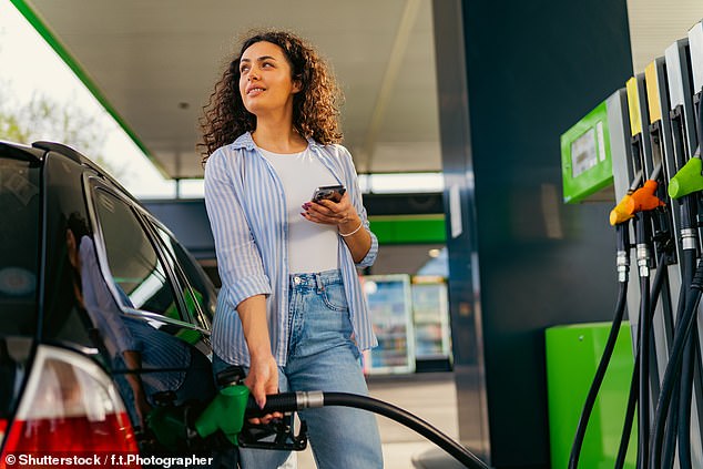 Tanked up: With fuel duty likely to increase by up to 7 pence a litre it will pay drivers yet to go electric to fill up with petrol or diesel ahead of Wednesday