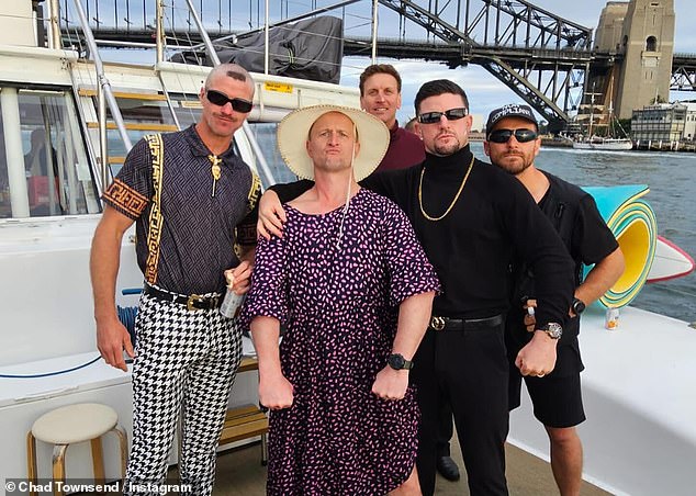 Townsend and his friends went overboard with their fancy-dress outfits as they partied around Sydney Harbour (pictured)