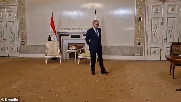 Putin was seen shuffling his feet as he waited for his Egyptian counterpart