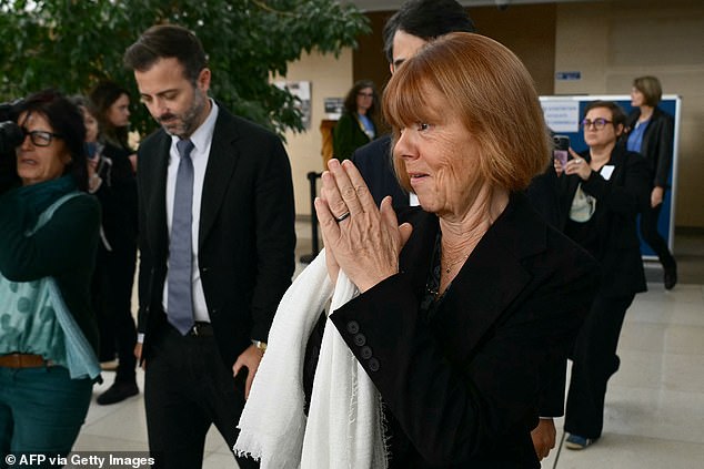 Gisele Pelicot gestures a she leaves the court in Avignon on October 23