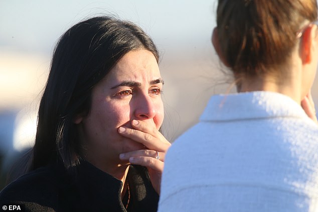 Family members wait anxiously for news amid the ongoing attack on the TUSAS headquarters