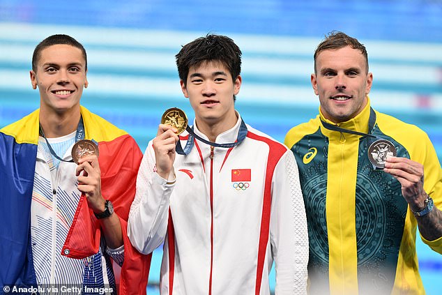 Chalmers (right) was on the end of terrible abuse after coming second to China's Zhanle Pan (middle) in the 100m freestyle final at the Paris Olympics